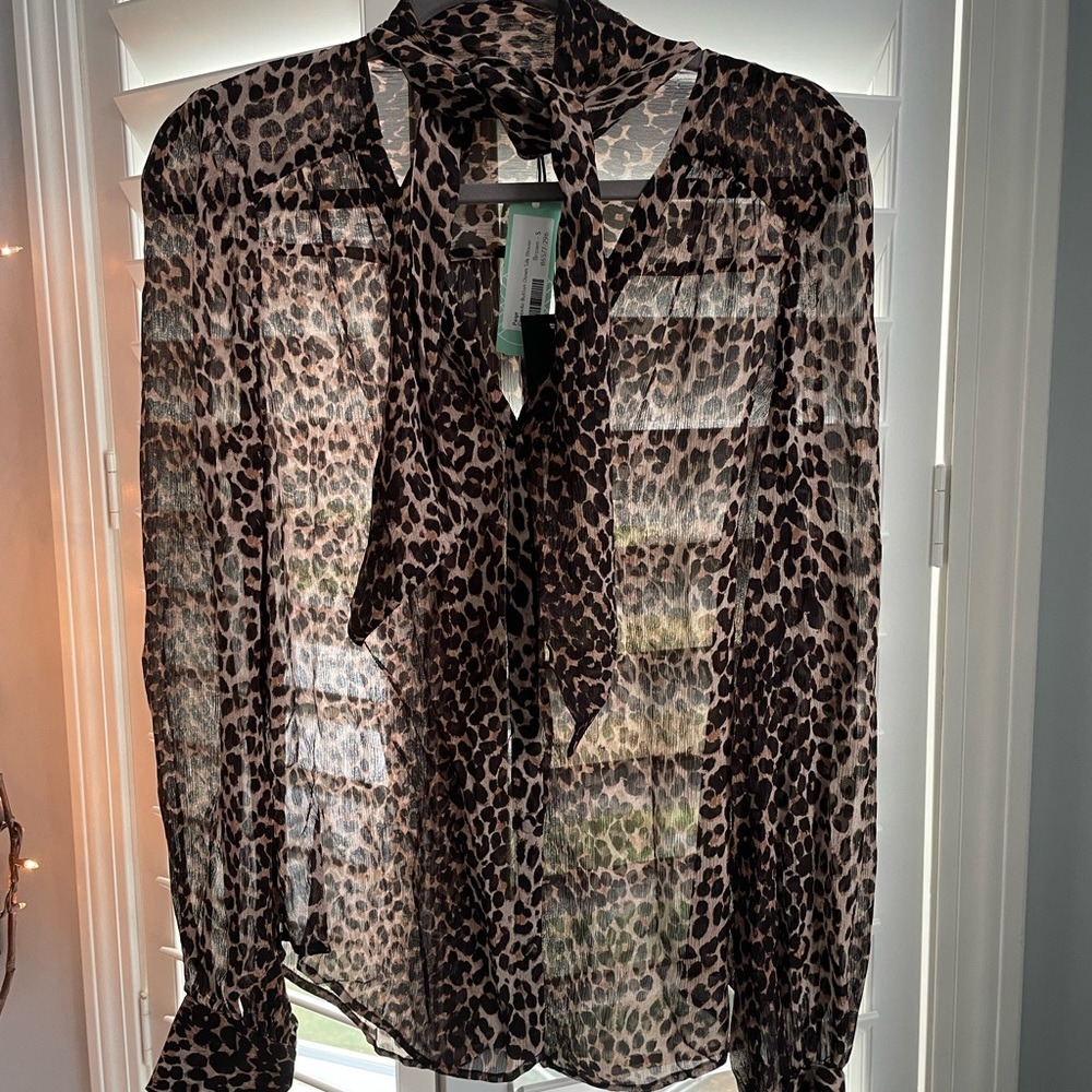 Women’s Brand new top with tags. Size S